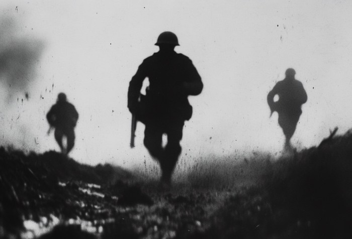 En esta impactante imagen en blanco y negro, la silueta de tres soldados avanzando entre sombras y niebla evoca la dureza de la guerra y el coraje en el campo de batalla. Perfecta para reflexionar sobre la historia y el sacrificio de los héroes anónimos.